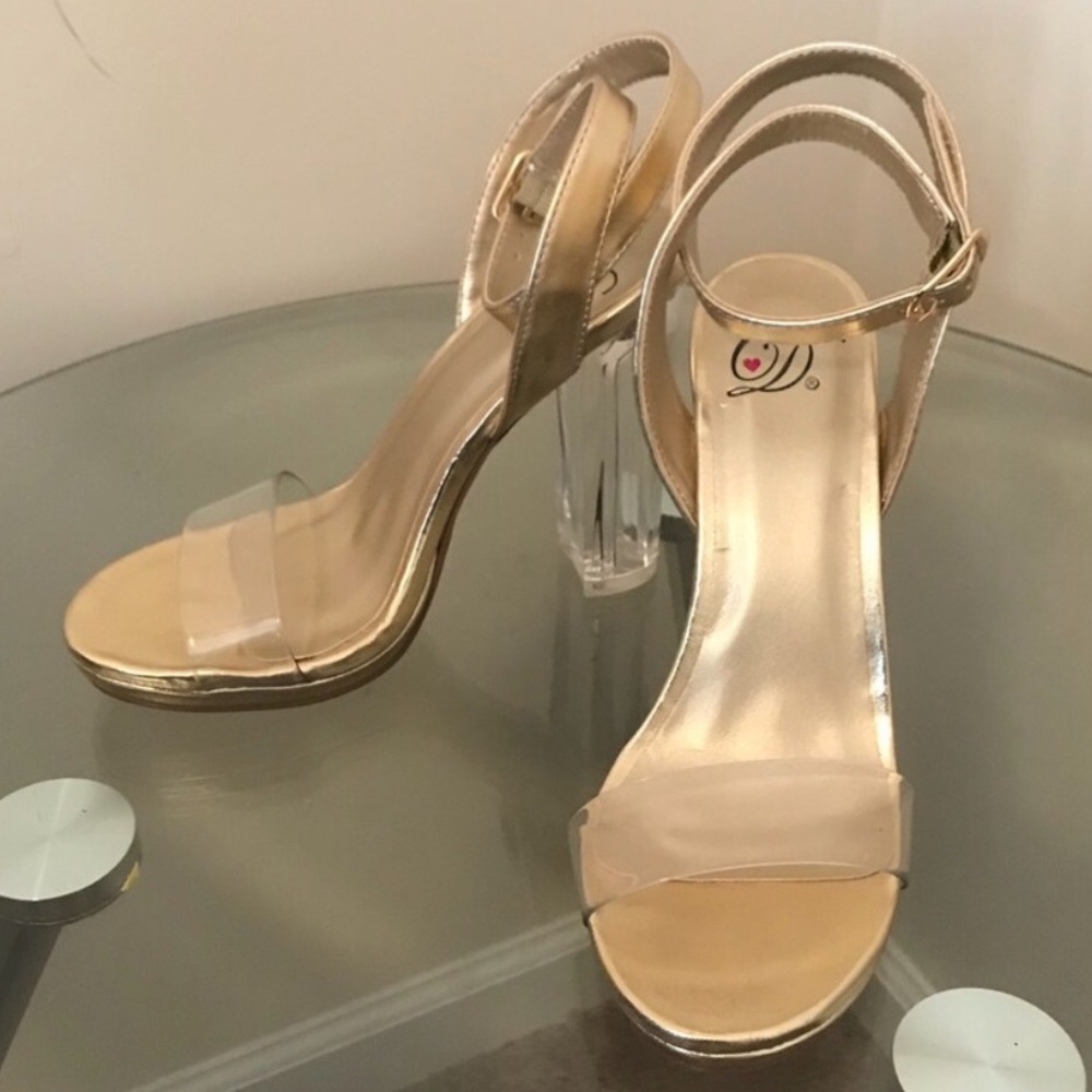 CLEAR HEELS WITH GOLD STRAPS/SOLE NEW WO TAG